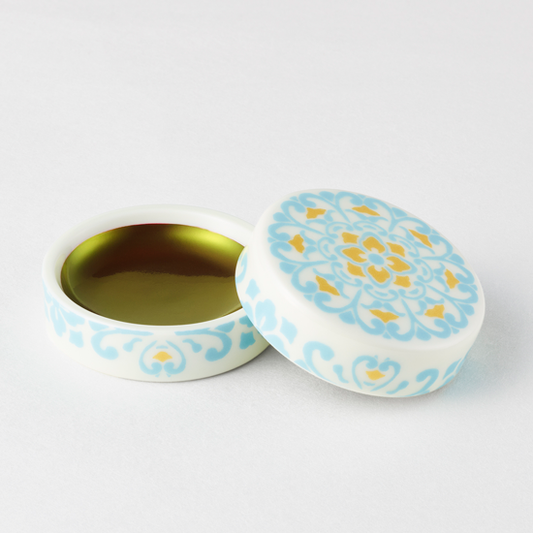 Komachi Beni luxury Japanese lip stain in Arita ware container with gold Yusoku pattern, traditional safflower makeup