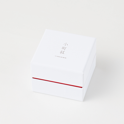 Komachi Beni luxury Japanese lip stain in Arita ware container with gold Yusoku pattern, traditional safflower makeup