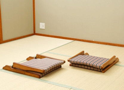 This is a Japanese-style wooden chair that can be easily folded and stored away. Its light weight and portability are its key features, making it a convenient choice for seating.