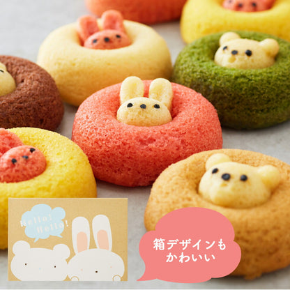 Box of 12 individually wrapped animal-shaped sponge cakes in assorted flavors including strawberry, plain, banana, chocolate, matcha, and caramel. Shaped like cute rabbits and bears, neatly arranged in a rectangular gift box measuring 21 × 30.2 × 8.5 cm.