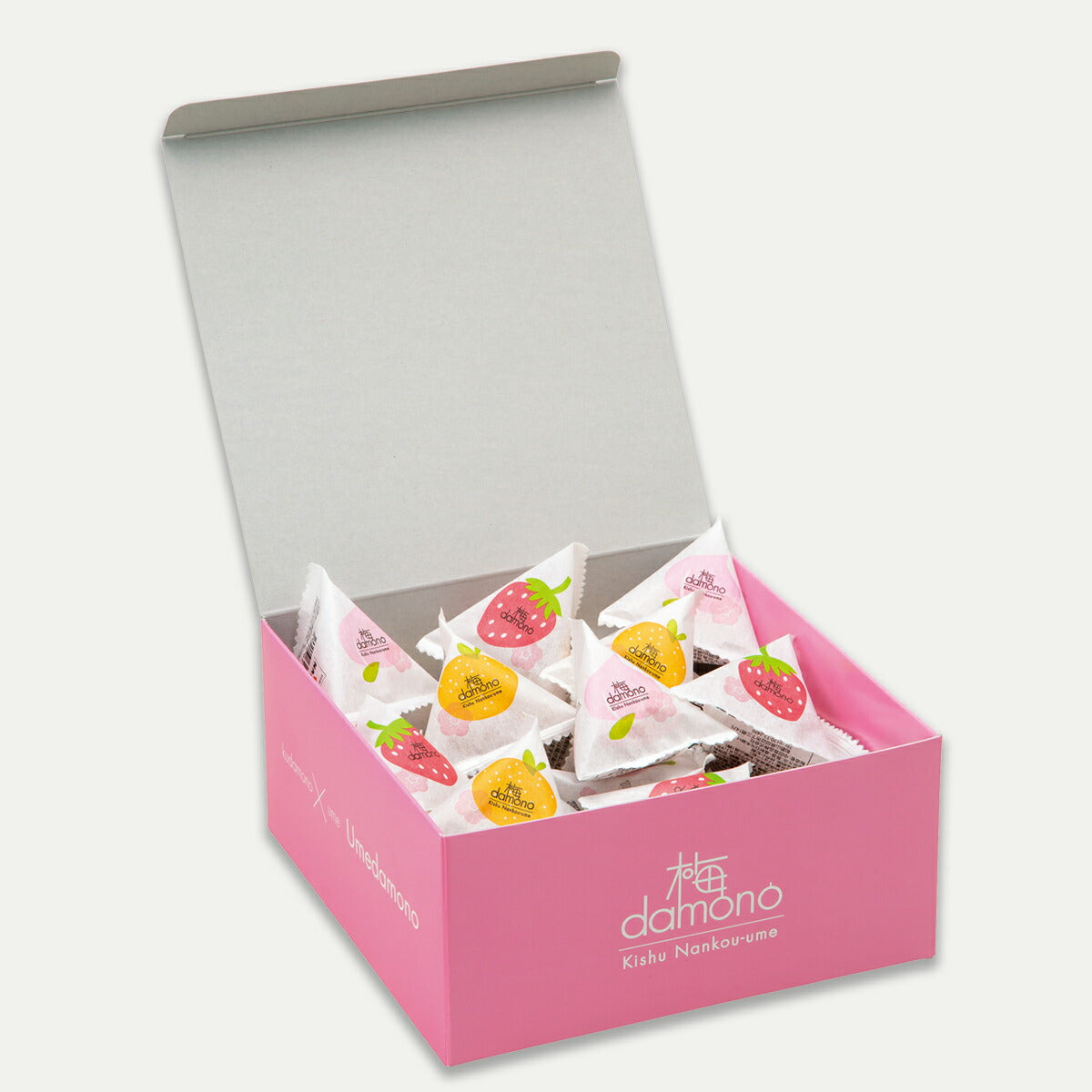 Individually wrapped Ume Damono fruit plums in mandarin, peach, and strawberry flavors, made with Kishu Nanko plums from Wakayama, Japan.